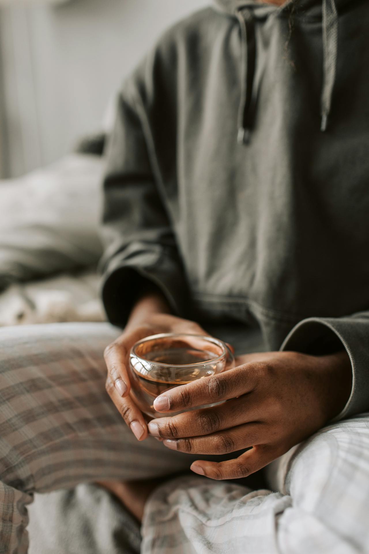 person holding tea