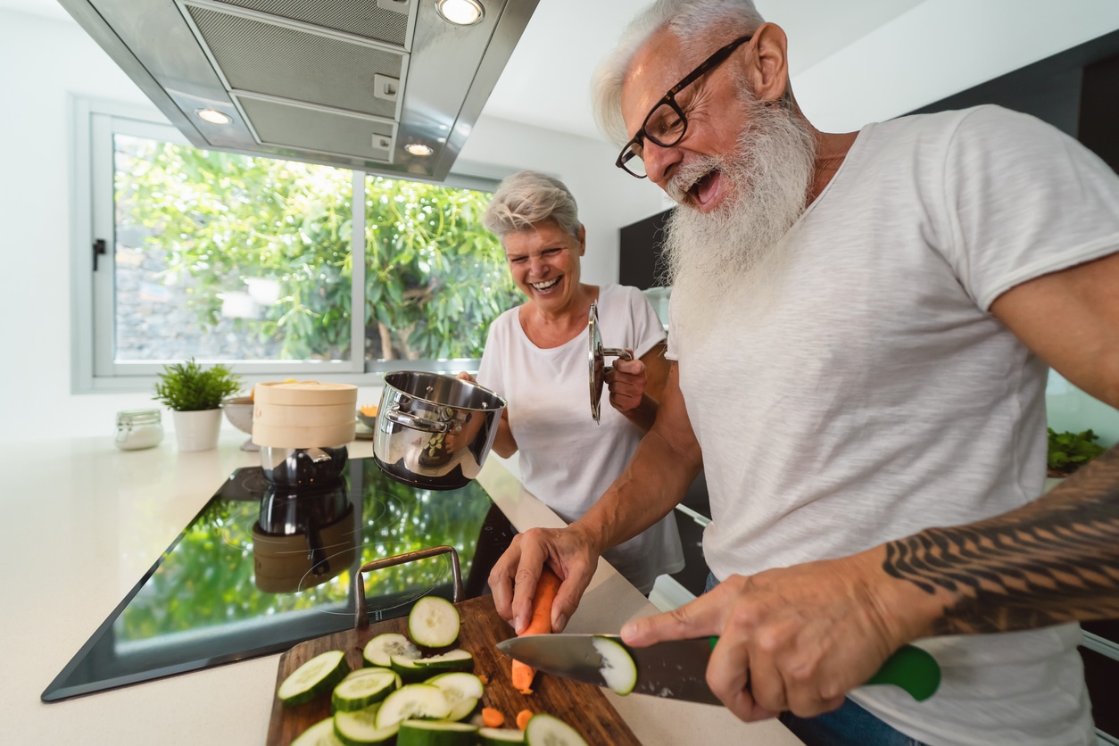 VegNews.ElderlyCoupleCooking.Getty