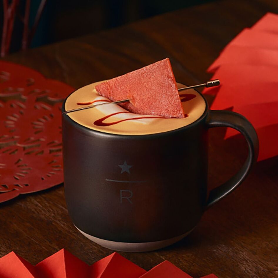 Yes, You Can Get Starbucks' New "Abundant Year Savory Latte" With Oat Milk, But What About That Giant Hunk of Pork?